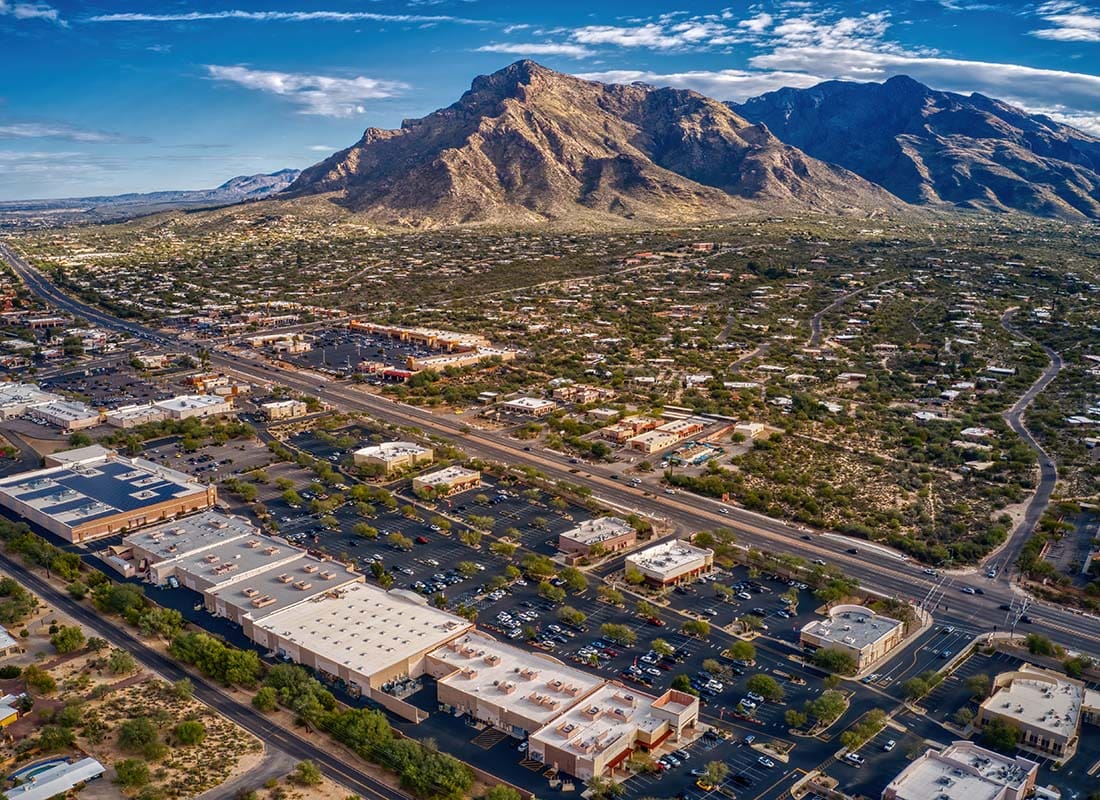 Oro Valley, AZ - Aerial View of the Suburb of Tucson Oro Valley Arizona Next to a Rock Formation on a Sunny Day